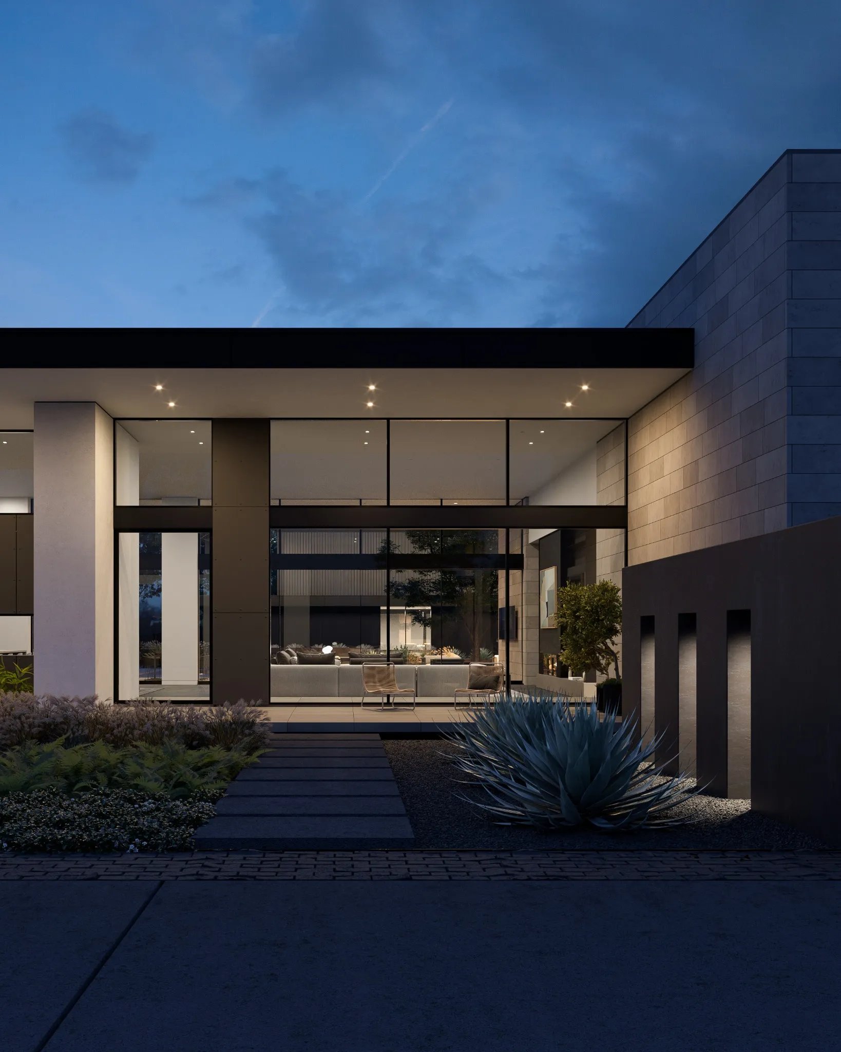 Modern Edge Builders residence front facade at dusk